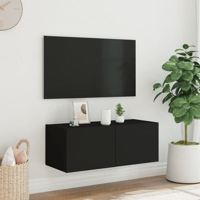 væghængt tv-bord med LED-lys 80x35x31 cm sort