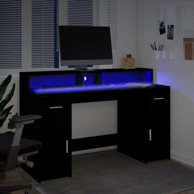 skrivebord med LED-lys 140x55x91 cm konstrueret træ sort